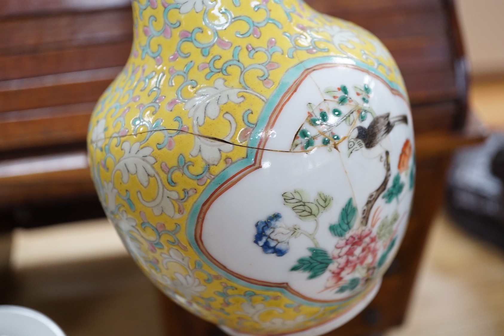 Two late 19th century Chinese porcelain vases, 31cm high, a/f